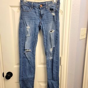 Size 2 stretch boot cut distressed jeans